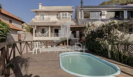 Casa com 3 quartos à venda na Rua Charruas, 267, Espírito Santo, Porto Alegre por R$ 1.267.000