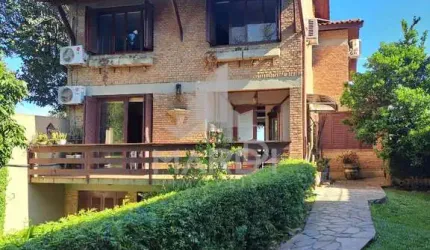 Casa com 3 quartos à venda na Rua Coroados, 1200, Vila Assunção, Porto Alegre por R$ 2.200.000