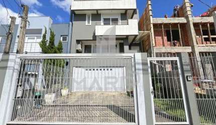 Casa com 3 quartos à venda na Rua Ivo Walter Kern, 230, Hípica, Porto Alegre por R$ 930.000