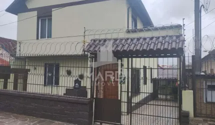 Apartamento com 3 quartos para alugar na Rua Oscar Tollens, 249, Santa Tereza, Porto Alegre por R$ 1.750