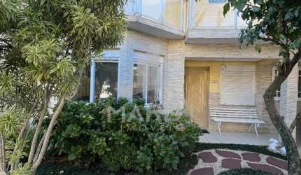 Casa com 4 quartos à venda na Rua Ancara, 381, Guarujá, Porto Alegre por R$ 960.000