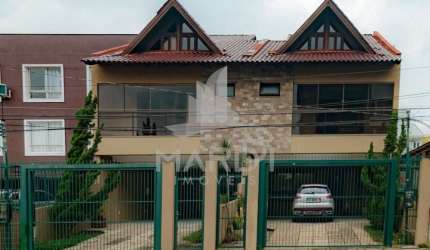 Casa com 3 quartos à venda na Rua Dom Jaime de Barros Câmara, 705, Sarandi, Porto Alegre por R$ 799.000