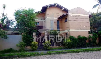 Casa com 3 quartos à venda na Rua Doutor Armando Barbedo, 133, Tristeza, Porto Alegre por R$ 1.278.000