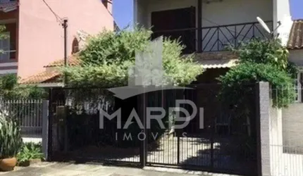 Casa com 3 quartos à venda na Rua Vacaria, 115, Hípica, Porto Alegre por R$ 430.000