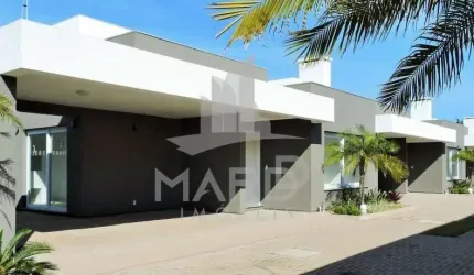 Casa em condomínio fechado com 3 quartos à venda na Rua Jacundá, 183, Guarujá, Porto Alegre por R$ 885.000