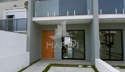 Casa com 2 quartos à venda na Rua Heitor Kramer, 704, Guarujá, Porto Alegre por R$ 449.000