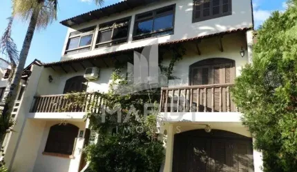 Casa em condomínio fechado com 5 quartos à venda na Avenida Otto Niemeyer, 1199, Tristeza, Porto Alegre por R$ 595.000