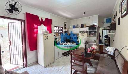Casa com 3 dormitórios à venda, 109 m² por R$ 360.000,00 - Plataforma - Mongaguá/SP
