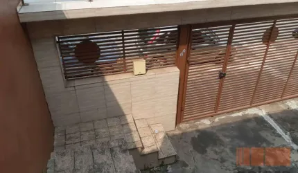 Casa térrea comercial e residencial com três dormitórios