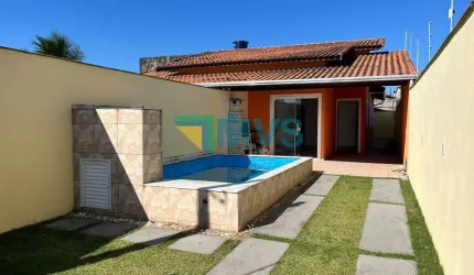 Imperdível: Casa à venda em Itanhaém-SP, Jardim Guacyra! 2 quartos, 1 suíte, 74m², 2 salas, 2 banheiros, 3 vagas de garagem.