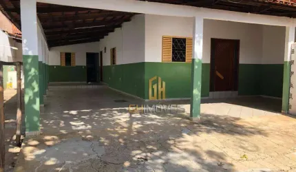 Casa e Barracão em lote com 400m² no Jardim America