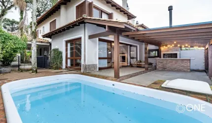 Casa em condomínio fechado com 4 quartos à venda na Rua Maracá, 240, Vila Assunção, Porto Alegre por R$ 2.800.000