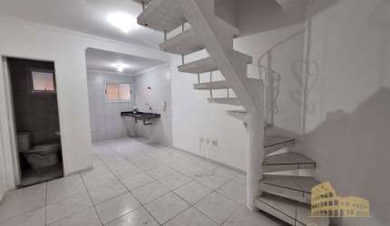 Casa com 2 dormitórios à venda por R$ 400.000,00 - Canto do Forte - Praia Grande/SP