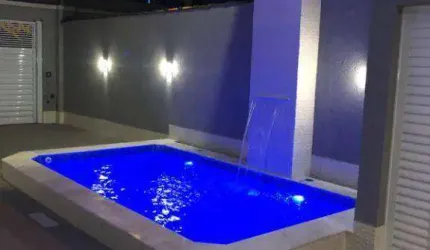 Sobrado com 3 dormitórios à venda, 151 m² por R$ 1.160.000,00 - Tupi - Praia Grande/SP