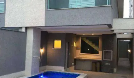 Sobrado com 3 dormitórios à venda, 151 m² por R$ 1.160.000,00 - Tupi - Praia Grande/SP