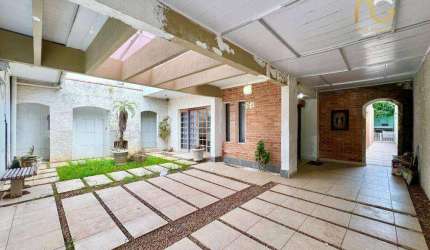 Casa com 3 dormitórios à venda, 128 m² por R$ 650.000,00 - Vila Assunção - Praia Grande/SP