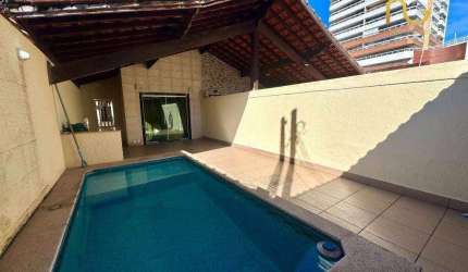 Casa com 3 dormitórios à venda, 112 m² por R$ 750.000,00 - Vila Guilhermina - Praia Grande/SP