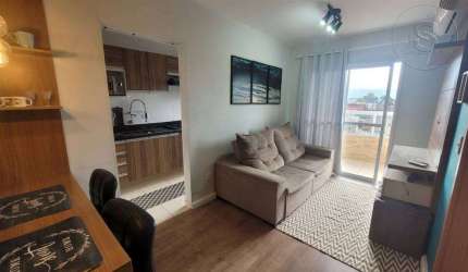 ALUGO APARTAMENTO MOBILIADO Á 550 METROS DA PRAIA DA AVIAÇÃO, 01 DORMITÓRIO PLANEJADO, SACADA, PRÉDIO COM ACESSIBILIDADE, PORTARIA ELETRÔNICA, PORTÃO AUTOMÁTICO, PISCINA, SALÃO DE FESTAS, SALÃO DE JOG