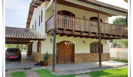 Casa com 5 dormitórios para alugar, 400 m² por R$ 4.687/mês - Jacaroá - Maricá/RJ