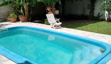 CASA COM PISCINA PARA LOCAÇÃO EM TRAMANDAÍ