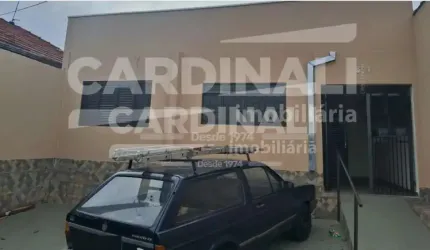 Prédio comercial com 04 salas e demais dependências, com ótima localização.