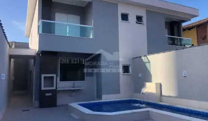 Sobrado Geminado na Vila Tupi, 3 suítes, piscina, sacadas, confira em Praia Grande.