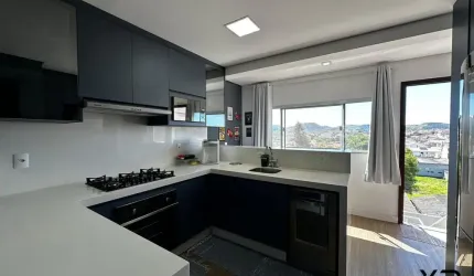Sobrado para alugar com 2 quartos, 2 banheiros e 2 vagas de garagem.