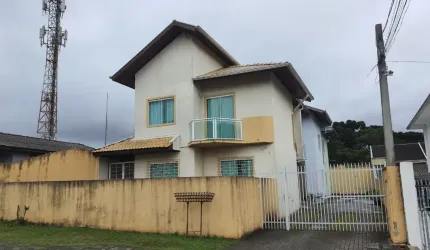 Sobrado para venda possui 101 metros quadrados com 3 quartos em Pinheirinho - Curitiba - PR