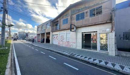 Sobrado comercial, com sala e sobreloja à venda no Capão Raso - Cód. 06.087