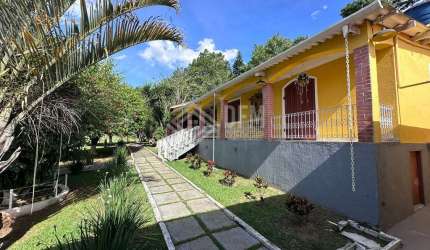 Espetacular Sítio à venda no bairro Itapeti em Mogi das Cruzes, SP, com 36.000 m² de área total, piscina e 4 suítes.