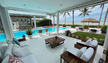 Casa pé na areia no condomínio da Riviera de São Lourenço
