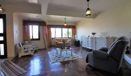 Casa com 4 quartos à venda na Rua Edgar Luiz Schneider, 38, Jardim Isabel, Porto Alegre por R$ 1.300.000