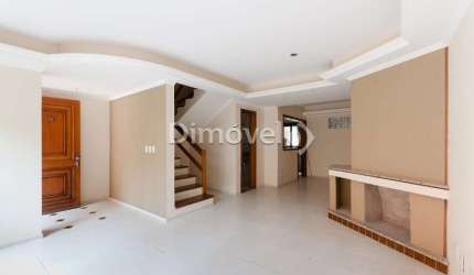 Casa em condomínio fechado com 3 quartos à venda na Rua Caeté, 525, Vila Assunção, Porto Alegre por R$ 990.000