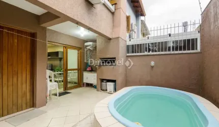 Casa com 3 quartos à venda na Rua Helio Felix Frey, 162, Espírito Santo, Porto Alegre por R$ 520.000