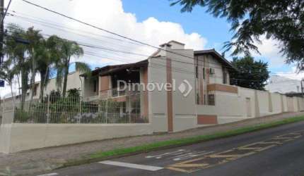 Casa com 4 quartos à venda na Rua Upamaroti, 836, Cristal, Porto Alegre por R$ 1.390.000