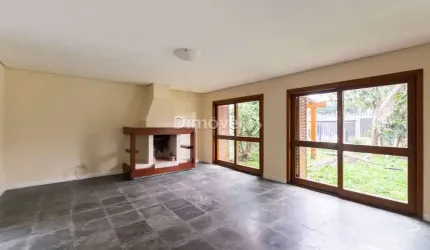 Casa com 4 quartos à venda na Rua Doutor Benjamin Camozato, 55, Jardim Isabel, Porto Alegre por R$ 1.400.000
