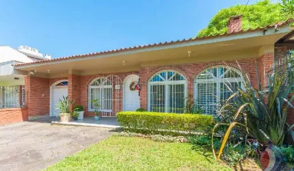 Casa com 4 quartos à venda na Avenida Copacabana, 218, Vila Assunção, Porto Alegre por R$ 1.699.000