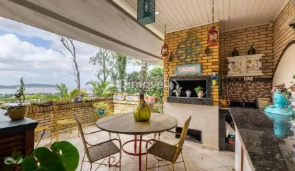 Casa em condomínio fechado com 5 quartos à venda na Rua Doutor Arnaldo da Silva Ferreira, 450, Jardim Isabel, Porto Alegre por R$ 1.500.000