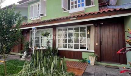 Casa em condomínio fechado com 2 quartos à venda na Rua Doutor Armando Barbedo, 1151, Tristeza, Porto Alegre por R$ 370.000