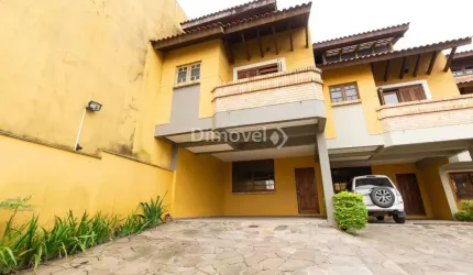 Casa em condomínio fechado com 3 quartos à venda na Rua Edgar Luiz Schneider, 54, Jardim Isabel, Porto Alegre por R$ 775.000