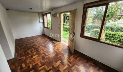 Casa em condomínio fechado com 3 quartos à venda na Rua Butuí, 673, Cristal, Porto Alegre por R$ 425.000