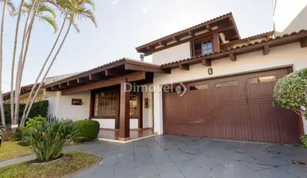 Casa com 3 quartos à venda na Rua Engenheiro Coelho Parreira, 384, Ipanema, Porto Alegre por R$ 1.180.000