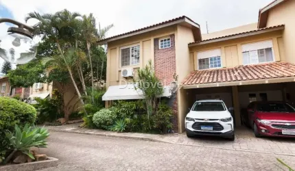 Casa em condomínio fechado com 3 quartos à venda na Rua Doutor Armando Barbedo, 832, Tristeza, Porto Alegre por R$ 850.000