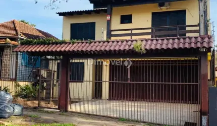 Casa com 3 quartos à venda na Rua Otávio Faria, 73, Teresópolis, Porto Alegre por R$ 1.300.000