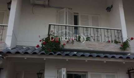 Casa com 2 quartos à venda na Rua Irmão Jaime Biazus, 43, Guarujá, Porto Alegre por R$ 599.000