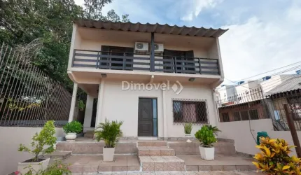 Casa com 4 quartos à venda na Avenida Belém Velho, 2335, Vila Nova, Porto Alegre por R$ 695.000