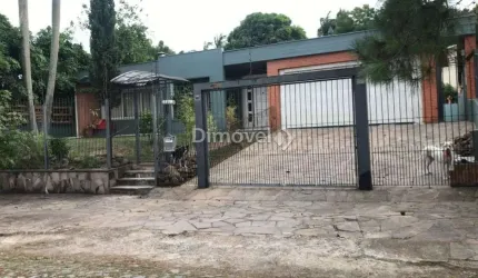 Casa com 4 quartos à venda na Rua Potiguara, 181, Vila Assunção, Porto Alegre por R$ 2.200.000