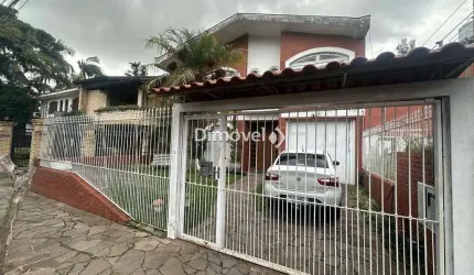 Casa com 4 quartos à venda na Rua Vicente Failace, 466, Tristeza, Porto Alegre por R$ 890.000