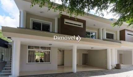 Casa em condomínio fechado com 3 quartos à venda na Avenida Coronel Marcos, 1460, Jardim Isabel, Porto Alegre por R$ 1.050.000