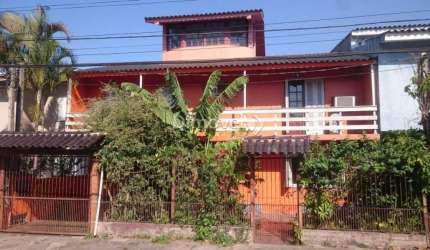 Casa com 4 quartos à venda na Rua Vinte e Um de Agosto, 183, Cavalhada, Porto Alegre por R$ 550.000